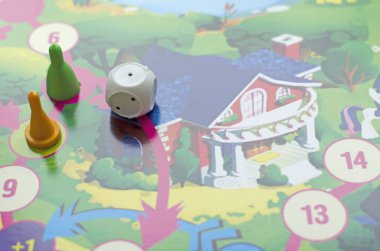 table game for children: chips, dice and play board