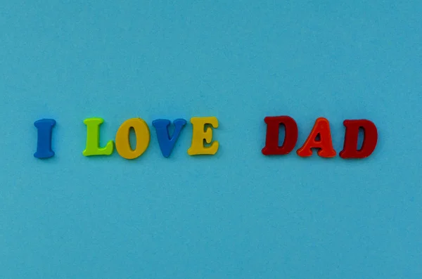 Texte Coloré Love Dad Lettres Magnétiques Sur Fond Papier Bleu — Photo