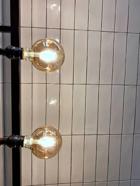 The light bulbs that lit in the hanging wall with ceramic wall