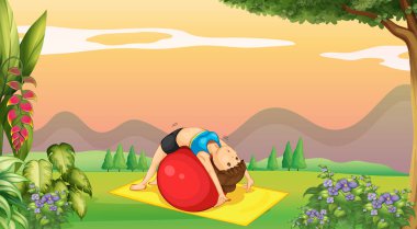 Kadın parkta büyük topu Yoga yapıyordum