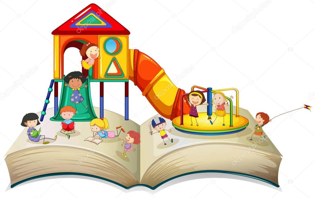 Children playing at playground on book