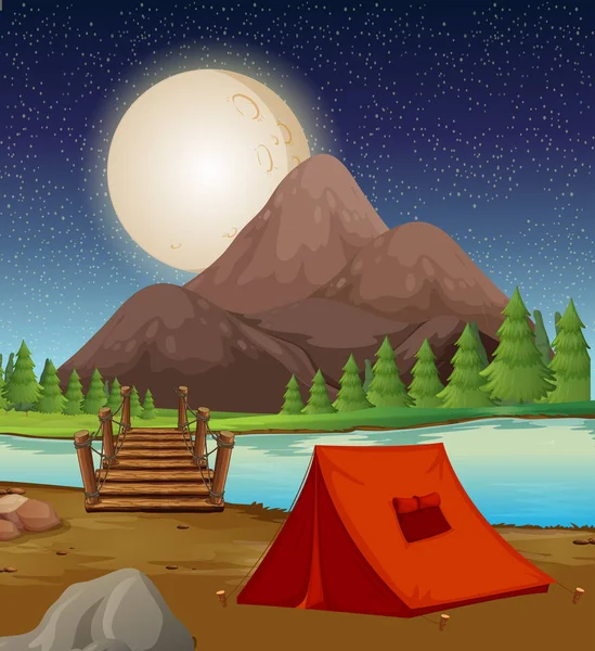 Camping ground with tent by the river at night