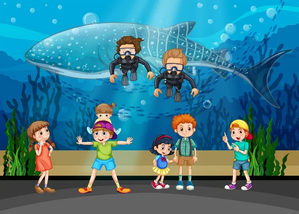 Crianças olhando para baleia e mergulhadores em aquário —  Vetores de Stock