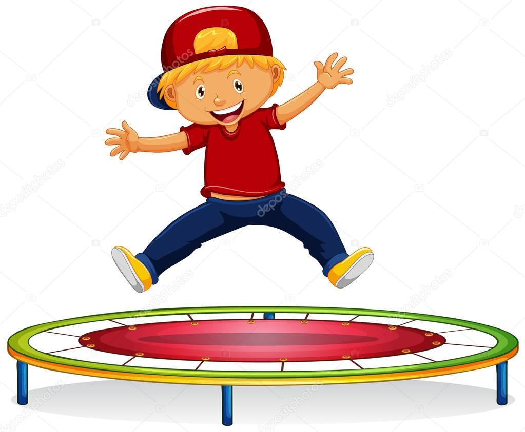 Happy boy jumping on trampoline