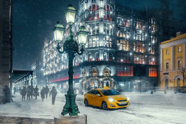 Moscow street. Winter landscape during snowstorm.