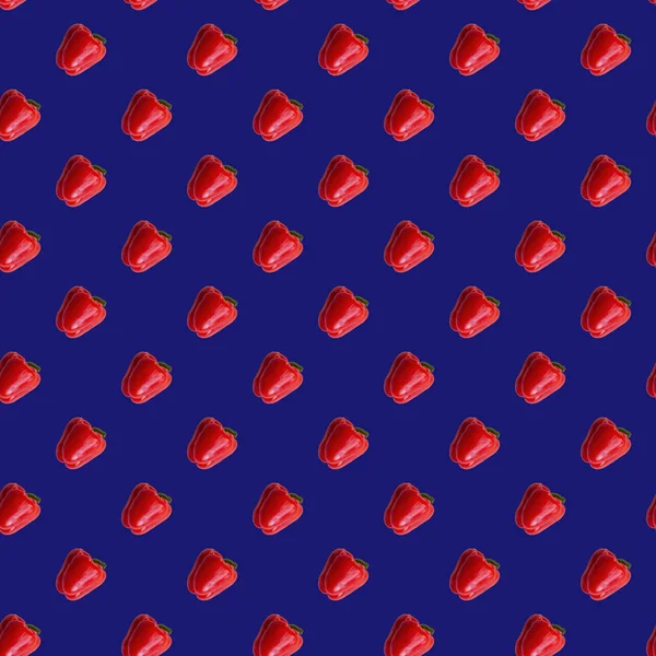 Red peppers seamless pattern on purple blue color — 스톡 사진