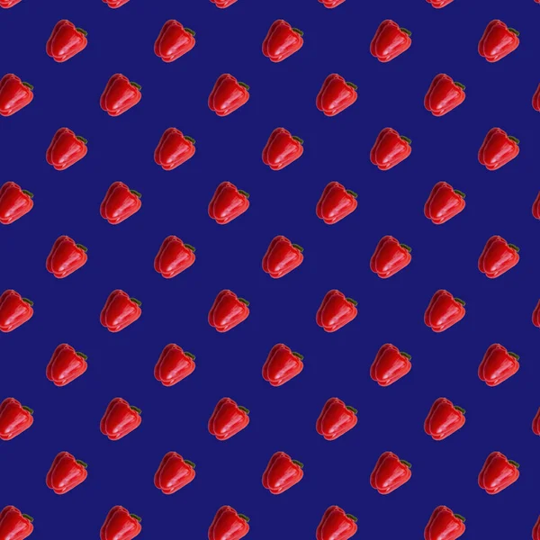 Red peppers seamless pattern on purple blue color — 스톡 사진