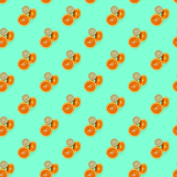 Seamless orange fruits pattern with green background — 스톡 사진