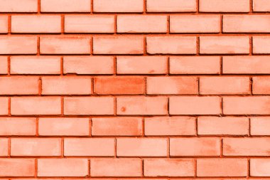  Tasarım için bir şablon olarak tuğla duvar. Turuncu tonlu moda kavramı, metin için boşluk. 