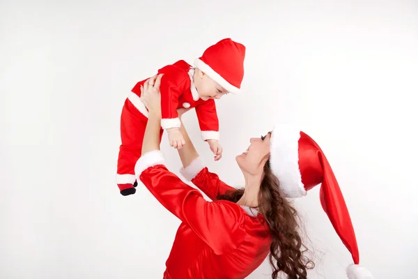Christmas mother and baby having fun — Stock Photo, Image