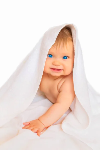 Happy smiling infant baby with white towel — Stock Photo, Image