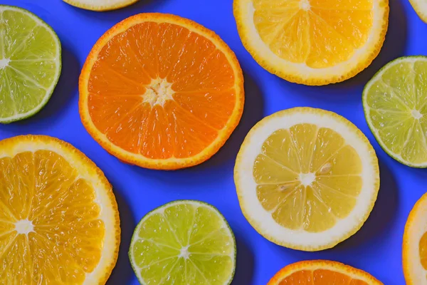 柑橘系フルーツのスライスと背景 — ストック写真
