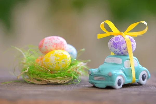 Toy car carrying easter eggs