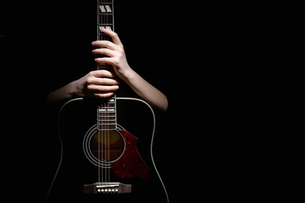Young Woman Hugging Her Hands Guitar Isolated Black — Stock Photo, Image
