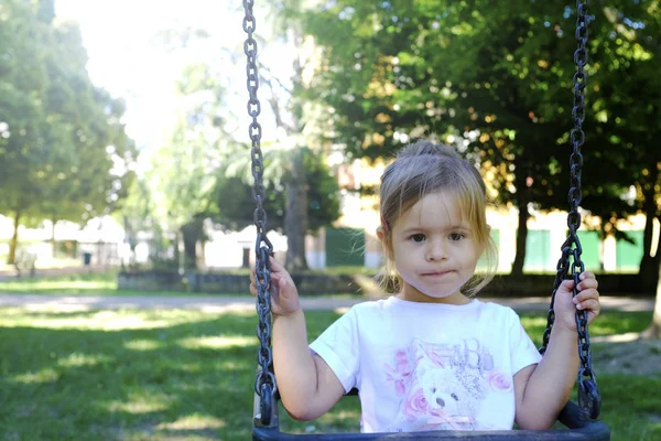 Little Girl Swing Playground Outdoors She Having Thoughtful Look Childhood — Stock Photo, Image