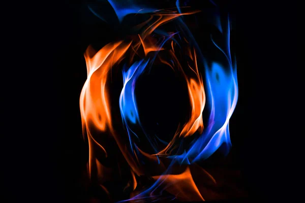Red and blue fire ring on balck background