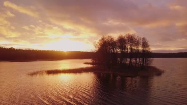 Lake sunset view with islands, aerial flight over the lake — Stock Video