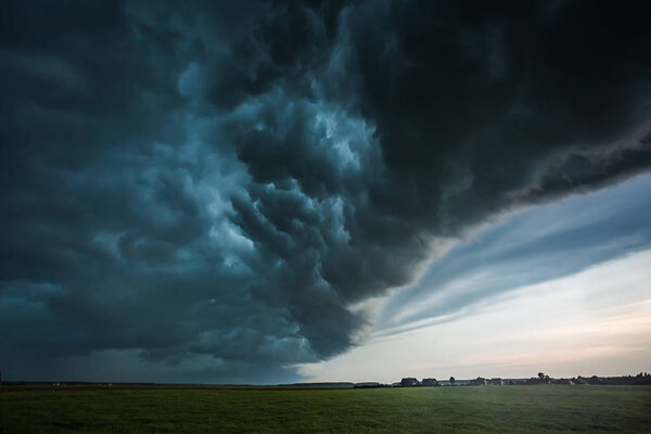 Storm clouds with shelf cloud and intense rain