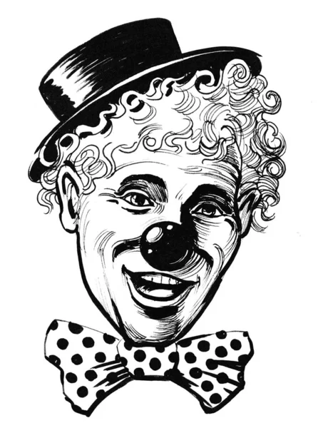 Smiling clown face. Ink black and white drawing