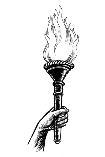 Hand with Olympic fire torch. Ink black and white drawing