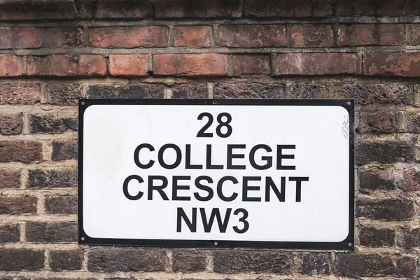 College Crescent street name sign near Swiss Cottage, London Borough of Camden, Hampstead, London, UK