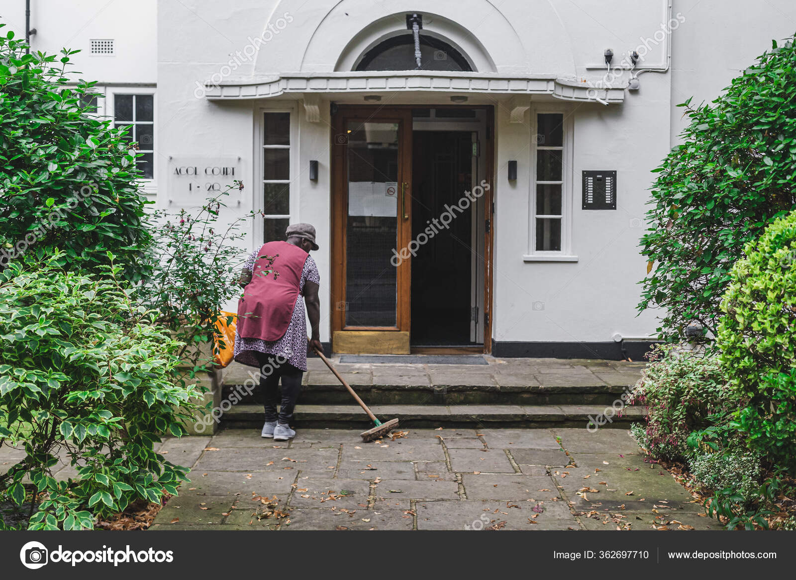 London Cleaning Lady Sweeping Floor Scrubber Terrace Apartment Building