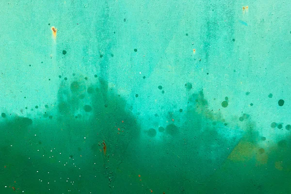 Green metal painted surface with spray paint .Texture of background — Stock Photo, Image