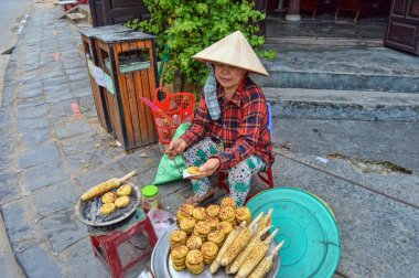 Street Vendor In Hoi An Old Town clipart