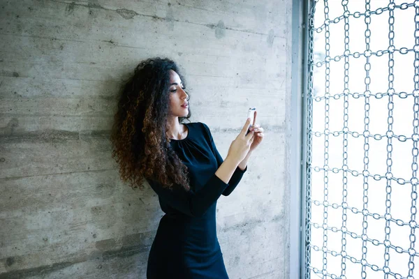 Beautiful Young Businesswoman Black Dress Using Smartphone Concrete Wall Background — Stock Photo, Image