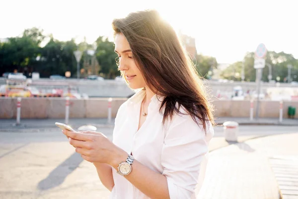 Beautiful Young Woman Holding Smartphone Hands While Standing Street Sunny — Stock Photo, Image