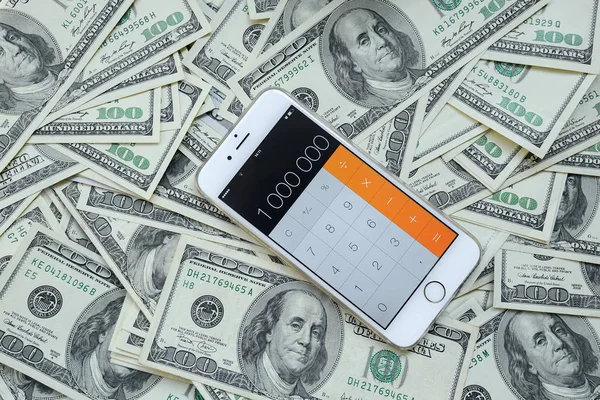 phone Calculator on money background