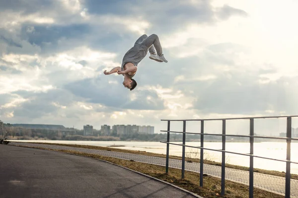 Teenagers jumping parkour action