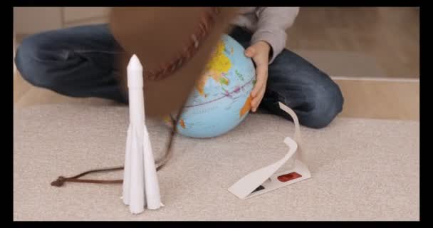 Child Plays Globe Rocket — Stock Video