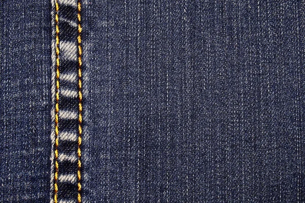 Um elemento de roupas de calça. Uma costura de fio amarelo à esquerda — Fotografia de Stock