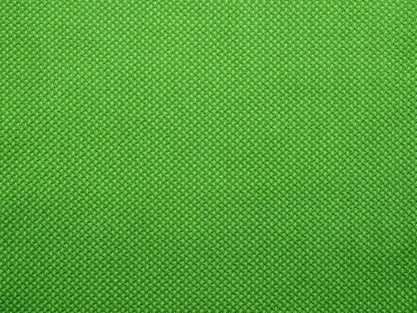 Perforált háló szerkezet a zöld. Háttér. — Stock Fotó