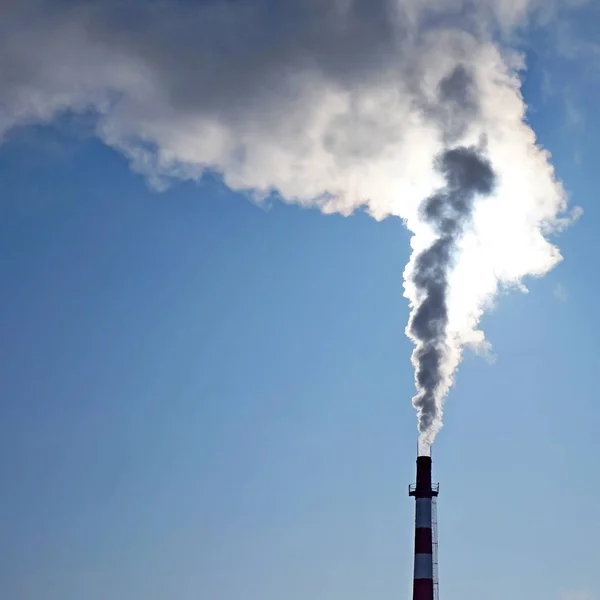 Ecology. Chimney with smoke