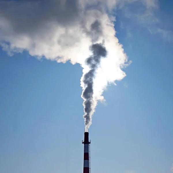 Ecology. Chimney with smoke