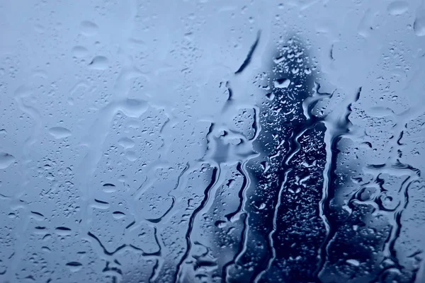 Contexto. Gotas de chuva rolar para baixo o vidro . — Fotografia de Stock