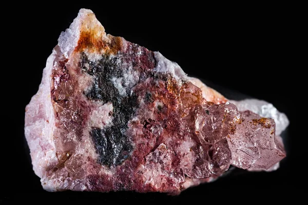 Rhodochrosit-Mineral auf schwarzem Hintergrund — Stockfoto