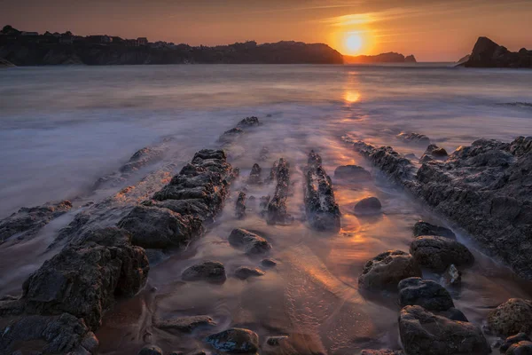 Pôr do sol na praia da Portio — Fotografia de Stock