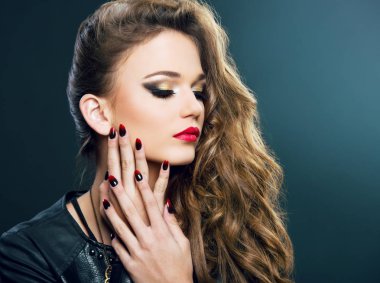 Sensual young woman on dark background, beauty and makeup clipart
