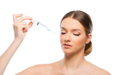 Güzel genç kadının Botox enjeksiyon yapması