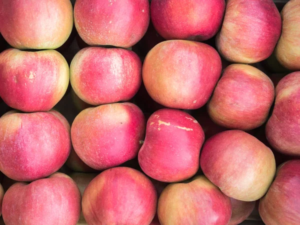 Red apples on sale at the market