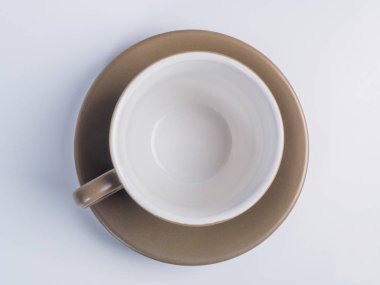 Beyaz arka plan üzerinde üstten görünüm izole kahve Kupası.