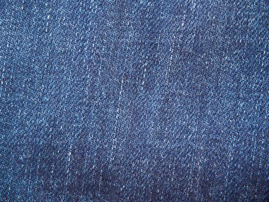Mavi pamuk malzeme, denim kumaş yakın çekim tam sayfa. Makro fotoğraf doku kot pantolon. Arka plan doku yakın çekim üzerinde en iyi görünümü