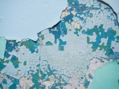 Kırık doku boya. Eski boya duvar eski sıva ve boya yüzey yakın çekim birkaç kat üzerinde. Arka plan doku renkli makro fotoğrafçılık.