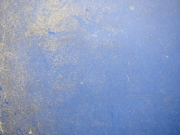 彩绘墙的纹理。墙上用旧的蓝色油漆、 污渍和滴在表面的特写。微距摄影彩色背景纹理 — 图库照片