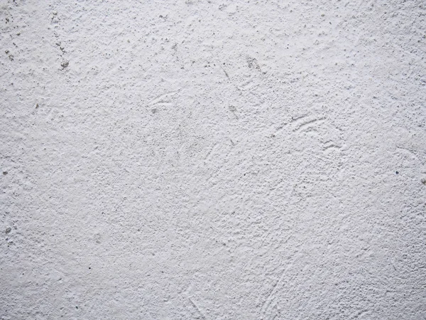 Texture of the putty. White plastered wall with stains and drips on a surface close-up. Macro photography colored texture of background — Stock Photo, Image