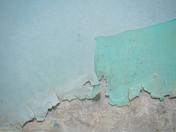 Ραγισμένα υφή της μπογιάς. Παλιό χρώμα στον τοίχο με το παλαιό ασβεστοκονίαμα και διάφορα στρώματα του χρώματος επιφάνεια close-up. Μακρο φωτογραφία χρώματος υφή φόντου. — Φωτογραφία Αρχείου