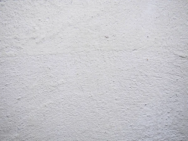 Textura de la masilla. Pared enlucida blanca con manchas y gotas en un primer plano de la superficie. Macro fotografía color textura de fondo —  Fotos de Stock